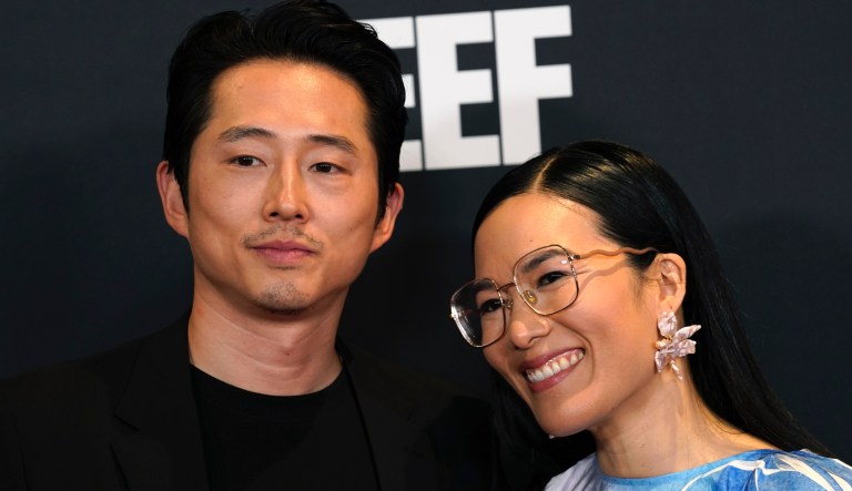 Steven Yeun, left, and Ali Wong pose together at the premiere of the Netflix series 
