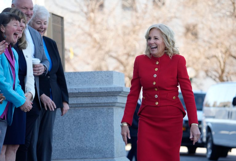 First lady Jill Biden greets Colorado lawmakers during a stop to attend a roundtable discussion on the federal workforce training program to help community college students earn certificates for entry-level jobs Monday, April 3, 2023, outside the State Capitol in Denver. 
