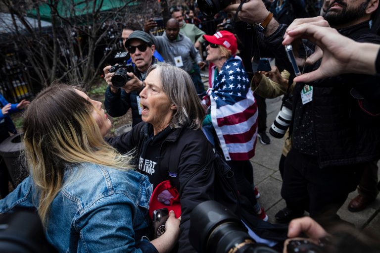 Protesters argue at the Collect Pond Park across the street from the Manhattan District Attorney's office in New York on Tuesday, April  4, 2023. 
