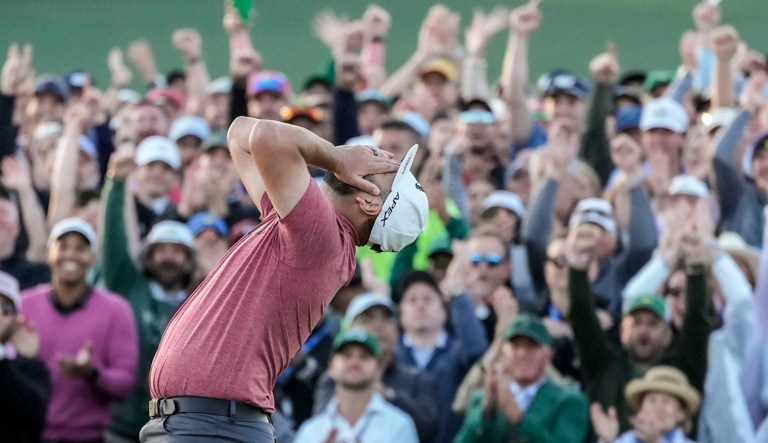 Jon Rahm, of Spain, celebrates on the 18th green after wining the Masters golf tournament at Augusta National Golf Club on Sunday, April 9, 2023, in Augusta, Georgia.
