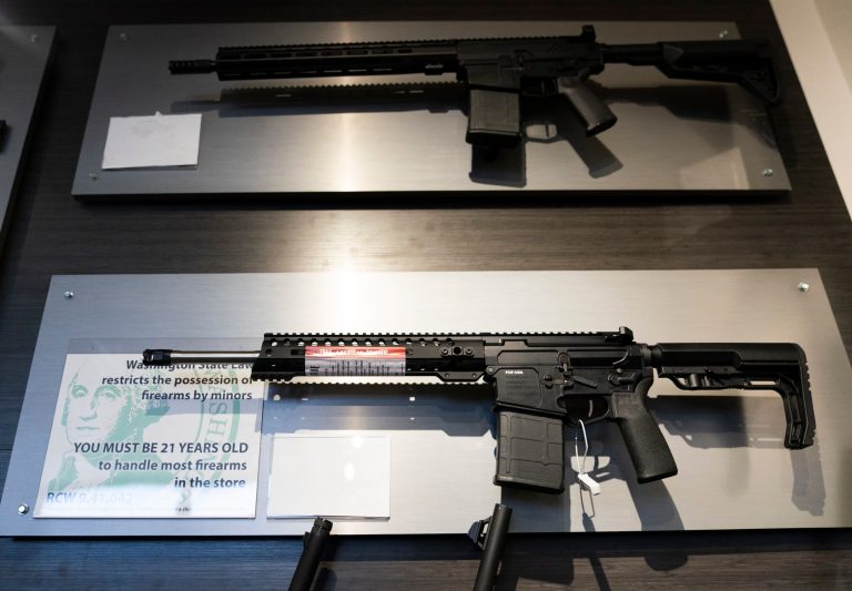 Semi-automatic rifles are displayed at Rainier Arms Friday, April 14, 2023, in Auburn, Washington. (AP Photo/Lindsey Wasson)