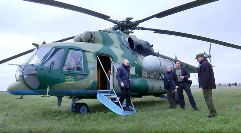 In this photo taken from video released by Russian TV Pool on Tuesday, April 18, 2023, Russian President Vladimir Putin arrives at an undisclosed location. The Kremlin says Putin has visited the headquarters of the Russian troops fighting in Ukraine.