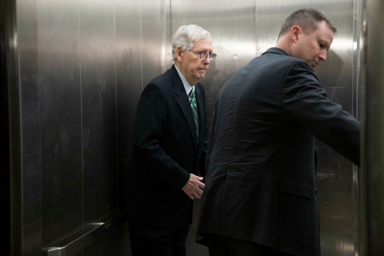 Senate Minority Leader Mitch McConnell, R-Ky., boards an elevator after attending a closed-door briefing about leaked highly classified military documents, Wednesday, April 19, 2023, on Capitol Hill in Washington. 