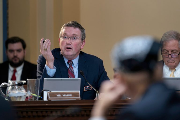 FILE - Rep. Thomas Massie, R-Ky., makes a point in the House Rules Committee as Republicans advance a bill to disapprove of action by the District of Columbia Council on a local voting rights act and a criminal code revision, at the Capitol in Washington.