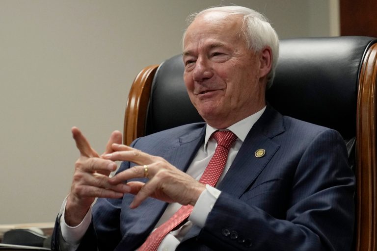 Former Arkansas Gov. Asa Hutchinson speaks during an interview in his office Wednesday, April 19, 2023, in Rogers, Ark.