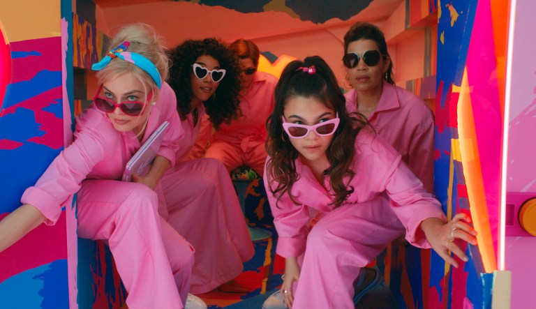 This image released by Warner Bros. Pictures shows Margot Robbie, from left, Alexandra Shipp, Michael Cera, Ariana Greenblatt and America Ferrera in a scene from 