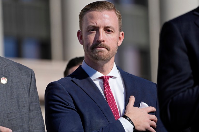 Oklahoma Superintendent of Public Instruction Ryan Walters holds his hand over his heart during the national anthem at inauguration ceremonies Jan. 9, 2023, in Oklahoma City.
