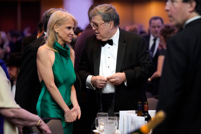 Kellyanne Conway speaks with former Attorney General William Barr as they arrive for the White House Correspondents' Association Dinner at the Washington Hilton in Washington, Saturday, April 29, 2023. 