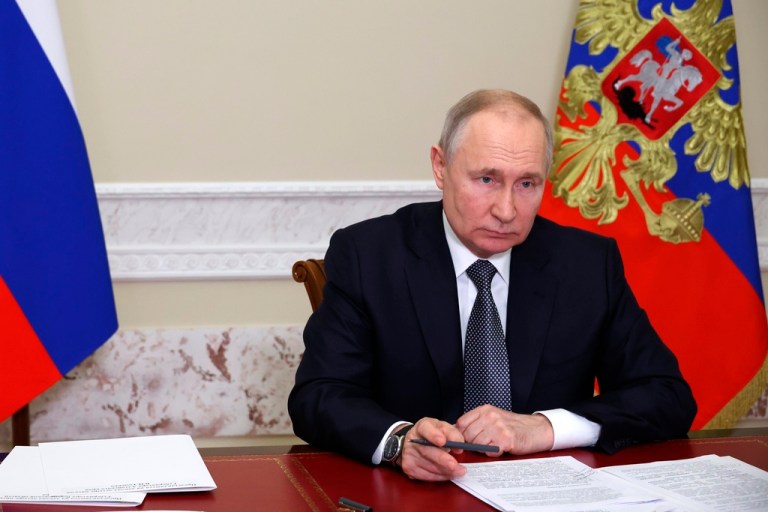 Russian President Vladimir Putin speaks to Altai Territory Governor Viktor Tomenko during their meeting via videoconference in Moscow, Russia, Tuesday, May 2, 2023.