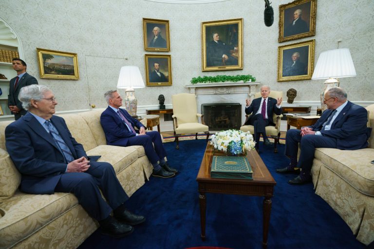 Senate Minority Leader Mitch McConnell of Ky., Speaker of the House Kevin McCarthy of Calif., and Senate Majority Leader Sen. Chuck Schumer of N.Y., listen as President Joe Biden speaks before a meeting to discuss the debt limit in the Oval Office of the White House, Tuesday, May 9, 2023, in Washington. 