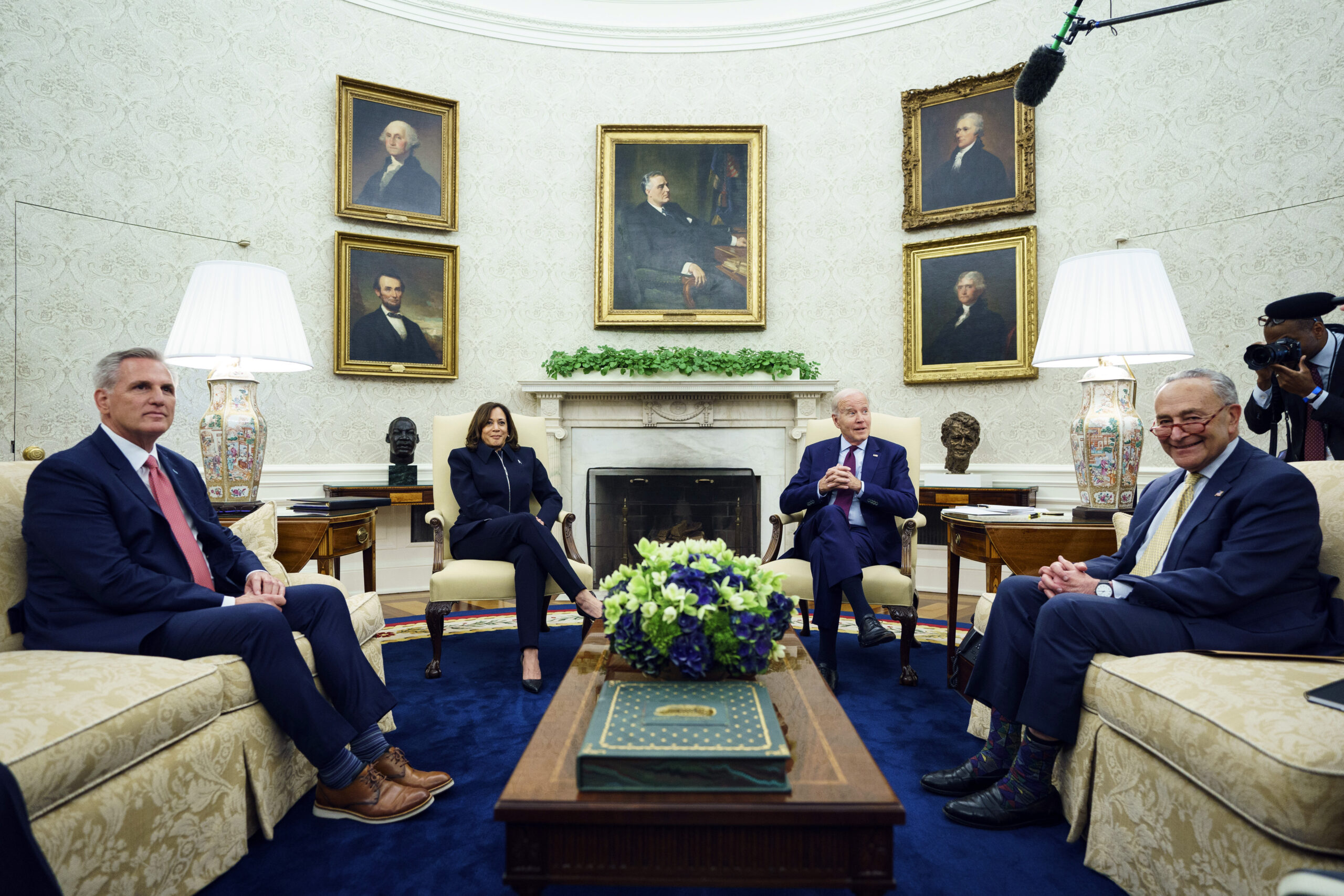 Biden cuts short trip abroad but still faces debt ceiling problems at home
