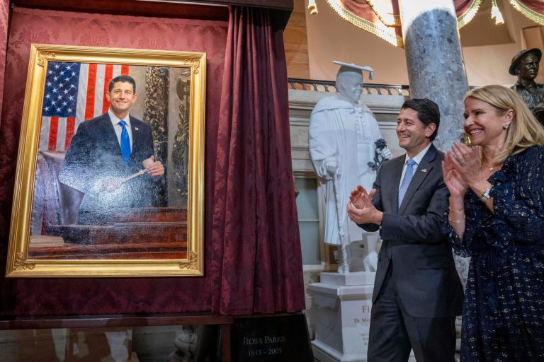Former House Speaker Paul Ryan and his wife Janna Ryan react during the unveiling of his portrait Wednesday, May 17, 2023, on Capitol Hill in Washington.