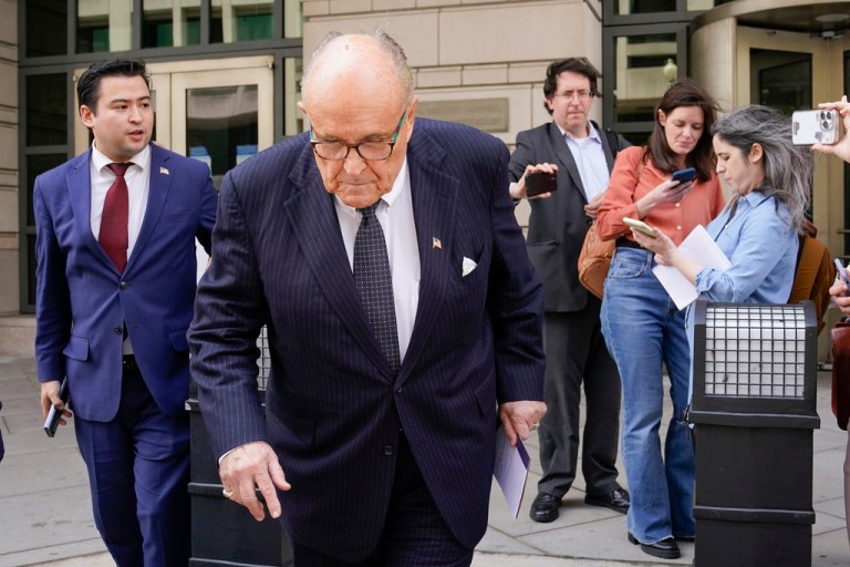 Rudy Giuliani departs the federal courthouse, Friday, May 19, 2023, in Washington.