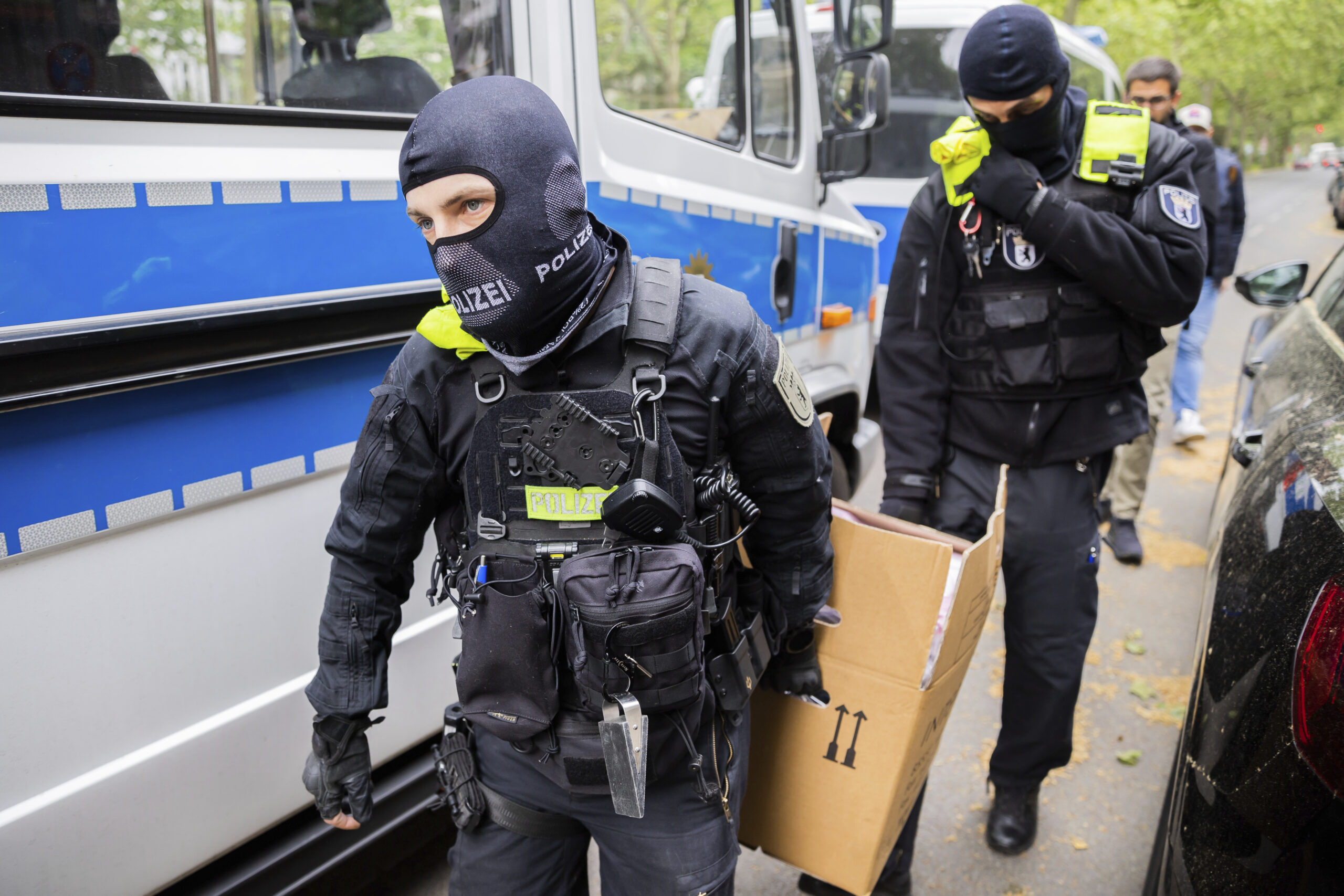 German police raid climate activists who stopped traffic and vandalized art