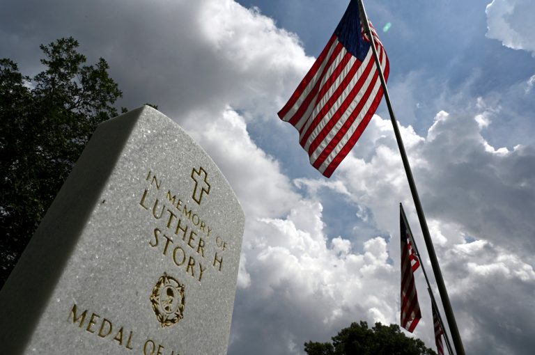 Picture shows headstone of Luther Story at Andersonville National Cemetery, Wednesday, May 17, 2023, in Andersonville, Georgia.