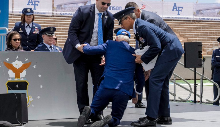 President Joe Biden falls onstage during the 2023 United States Air Force Academy Graduation Ceremony at Falcon Stadium, Thursday, June 1, 2023, at the United States Air Force Academy in Colorado Springs, Colorado.