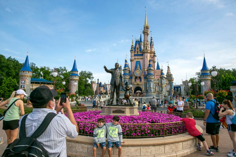 People visit the Magic Kingdom Park at Walt Disney World Resort in Lake Buena Vista, Florida on April 18, 2022.