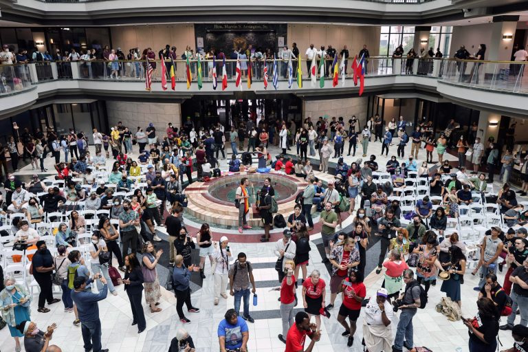 Protesters gather in the atrium of Atlanta City Hall to protest the proposed police training center on Monday, June 5, 2023. 