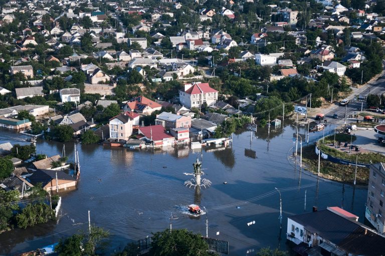 Streets are flooded in Kherson, Ukraine, Wednesday, June 7, 2023, after the walls of the Kakhovka dam collapsed. Residents of southern Ukraine, some who spent the night on rooftops, braced for a second day of swelling floodwaters on Wednesday as authorities warned that a Dnieper River dam breach would continue to unleash pent-up waters from a giant reservoir. 