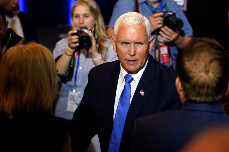 Republican presidential candidate former Vice President Mike Pence greets audience members at a campaign event, Wednesday, June 7, 2023, in Ankeny, Iowa. 