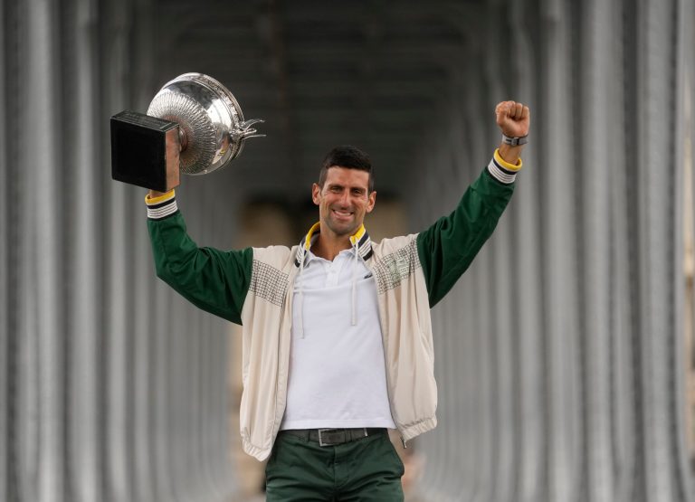 Serbia's Novak Djokovic poses with his trophy one day after winning the French Open tennis tournament in Paris, Monday, June 12, 2023. Novak Djokovic returned to No. 1 in the ATP rankings on Monday, replacing Carlos Alcaraz there, after winning the French Open for a men's-record 23rd Grand Slam title.