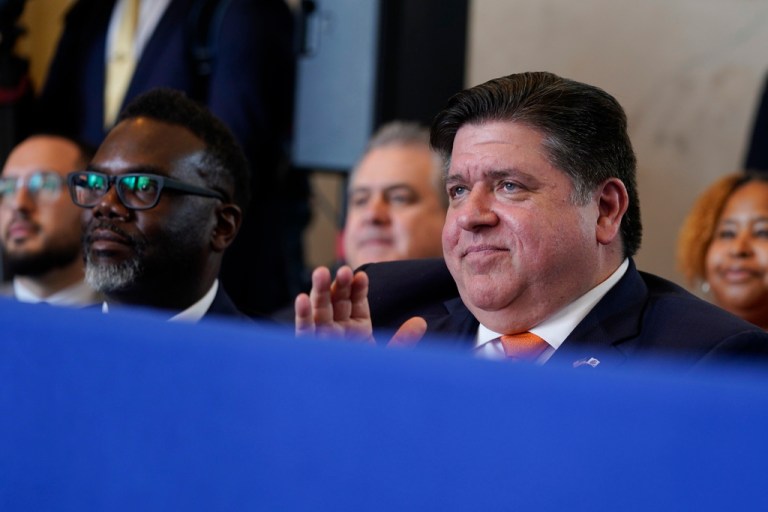 Gov. J.B. Pritzker (D-IL), front right, and Chicago Mayor Brandon Johnson, front left, Wednesday, June 28, 2023. 