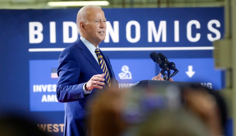 President Joe Biden speaks during a stop at a solar manufacturing company that's part of his 