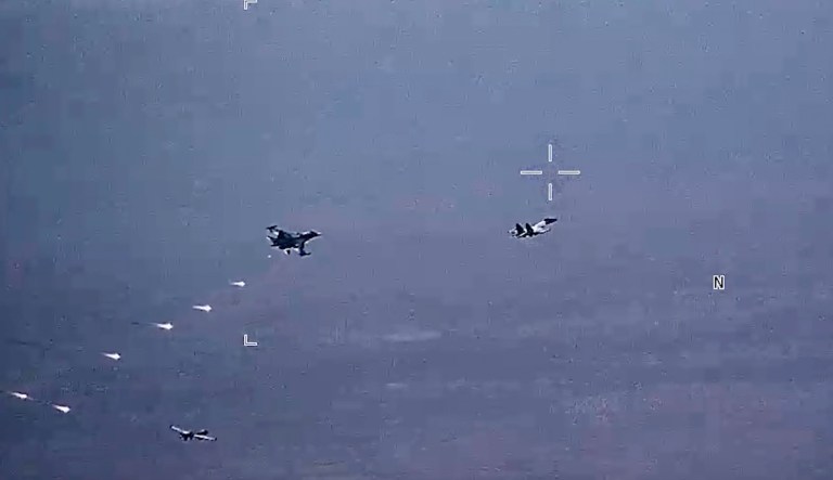 ISIS leader killed in airstrike by US drones that were harassed by Russian fighter jets