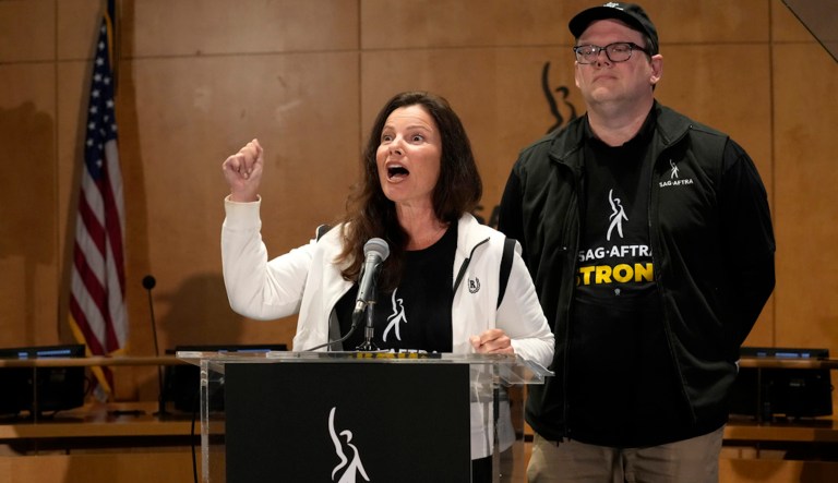 SAG-AFTRA president Fran Drescher, left, and SAG-AFTRA National Executive Director and Chief Negotiator Duncan Crabtree-Ireland speak during a press conference announcing a strike by The Screen Actors Guild-American Federation of Television and Radio Artists on Thursday, July, 13, 2023, in Los Angeles.