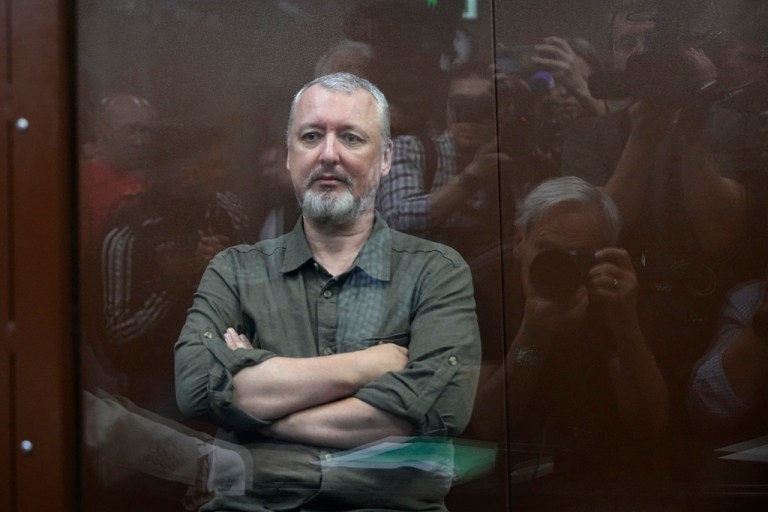 Igor Girkin, also known as Igor Strelkov, the former military chief of Russia-backed separatists in eastern Ukraine, sits in a glass cage in a courtroom at the Meshchansky District Court in Moscow, Russia, on July 21, 2023.