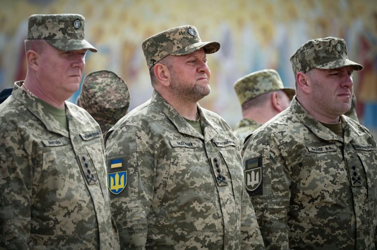 Commander-in-Chief of Ukraine's Armed Forces Valeriy Zaluzhny, center, attends an event for marking Statehood Day in Mykhailivska Square in Kyiv, Friday, July 28, 2023.