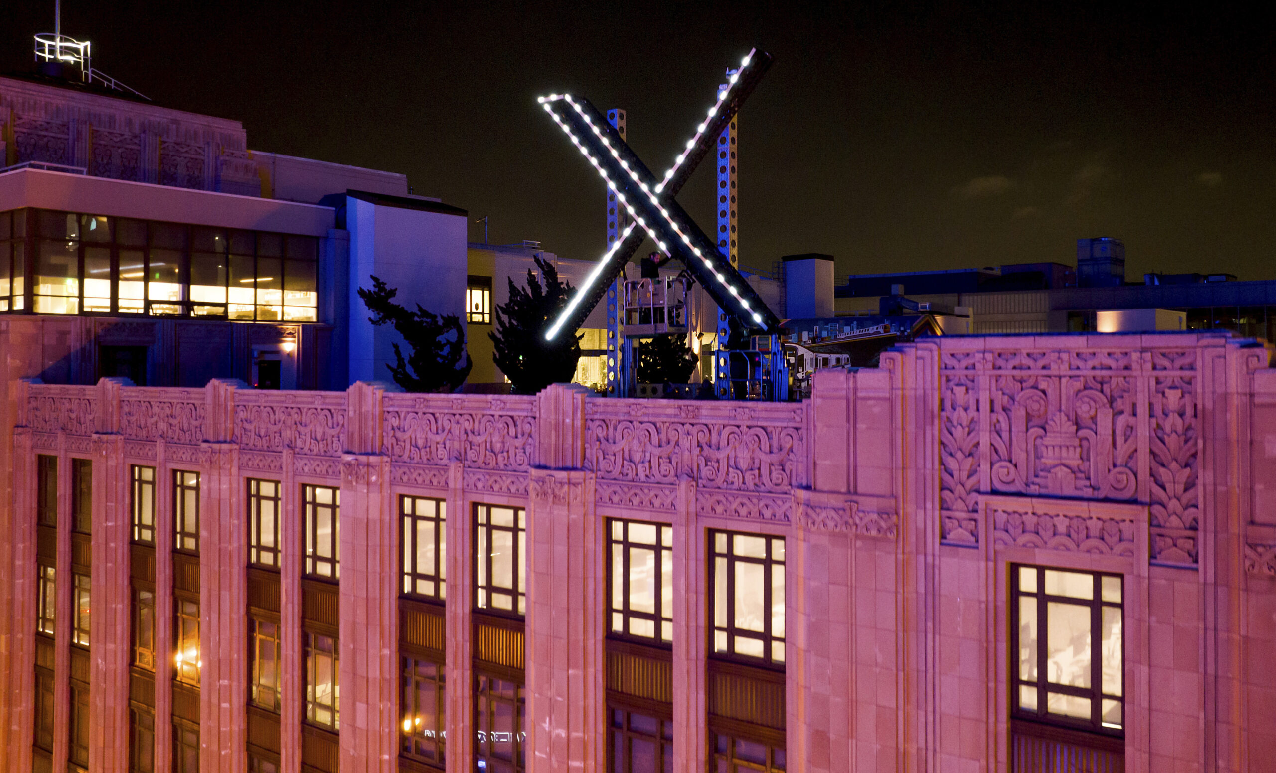 Giant sign on Elon Musk’s X headquarters removed following dozens of complaints