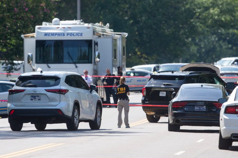 Tennessee Bureau of Investigation agents and Memphis Police Department officers respond to a scene near the intersection of McCrory Avenue and Gary Street in Memphis, Tenn., Monday, July 31, 2023. Memphis police said officers shot a suspect after he attempted to enter a Jewish school with a gun and fired shots after he couldn't get into the building. 