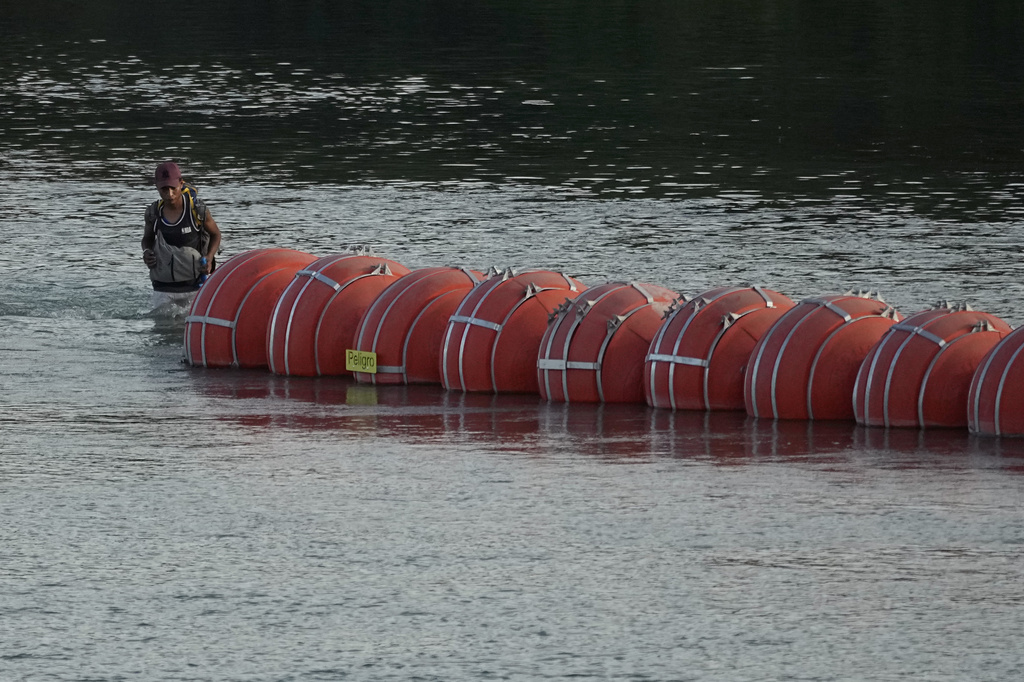 Texas ordered to remove Rio Grande barrier as court case continues