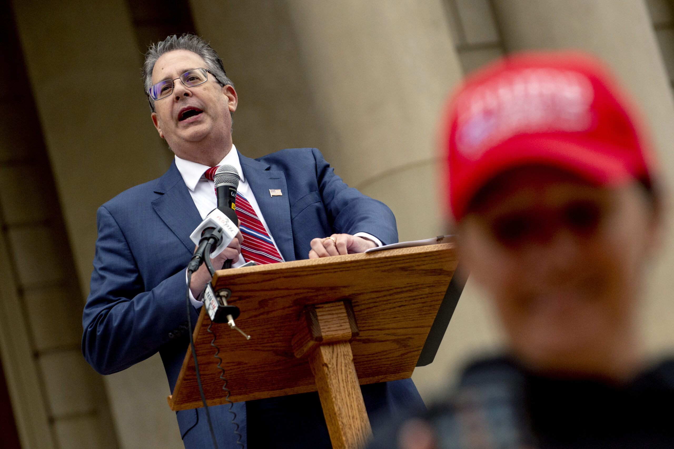 Trump allies in Michigan charged with possession of a voting machine