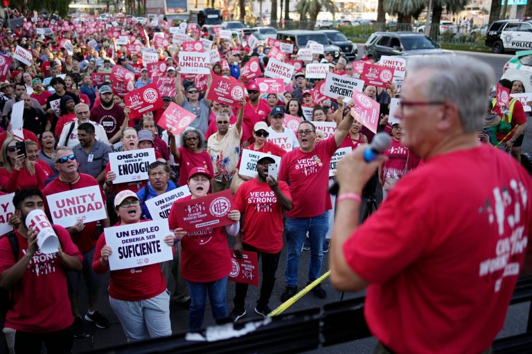 Members of the Culinary Workers Union cheer as Secretary-Treasurer Ted Pappageorge speaks during a rally along the Las Vegas Strip, Thursday, Aug. 10, 2023, in Las Vegas.