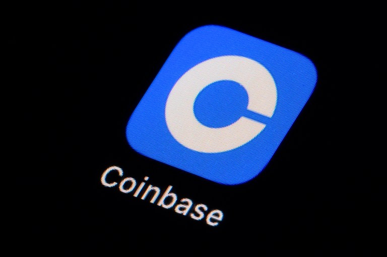 The Coinbase app icon is seen on a smartphone, Tuesday, Feb. 28, 2023.