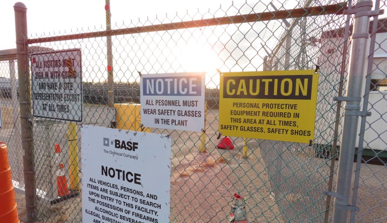 A gate at the entrance to the former Ciba Geigy chemical plant in Toms River, N.J., is filled with warning in this Jan. 24, 2023, file photo regarding the contaminated area, which is on the Superfund list of the nation's worst toxic waste sites.