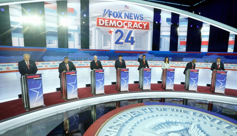 Republican presidential candidates, from left, former Arkansas Gov. Asa Hutchinson, former New Jersey Gov. Chris Christie, former Vice President Mike Pence, Florida Gov. Ron DeSantis, businessman Vivek Ramaswamy, former U.S. Ambassador to the United Nations Nikki Haley, Sen. Tim Scott (R-SC), and Gov. Doug Burgum (R-ND) stand onstage before a Republican presidential primary debate hosted by Fox News on Wednesday, Aug. 23, 2023, in Milwaukee.