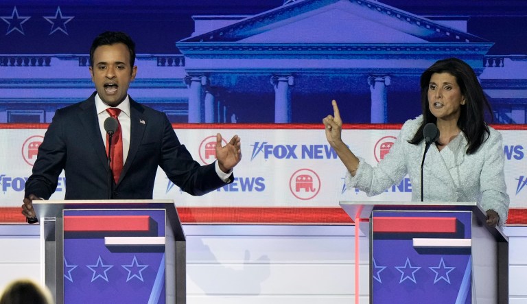 Businessman Vivek Ramaswamy and former U.N. Ambassador Nikki Haley speak during a Republican presidential primary debate hosted by Fox News on Wednesday, Aug. 23, 2023, in Milwaukee. 
