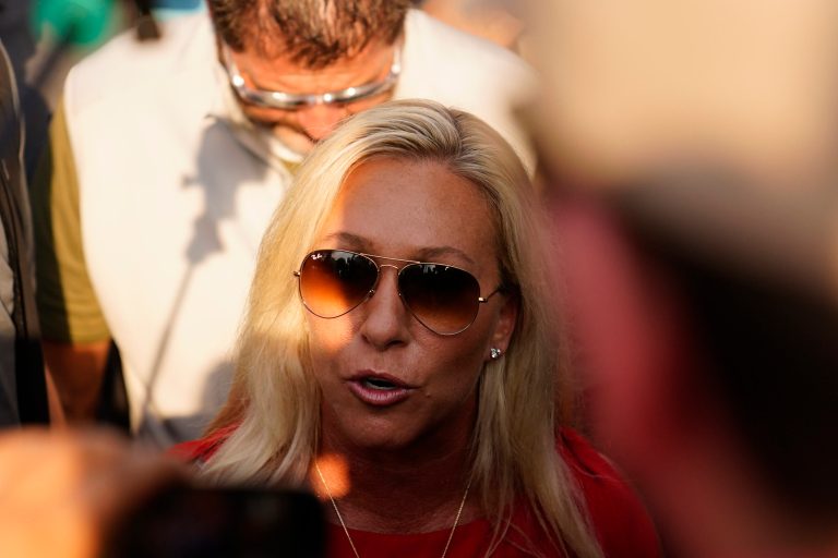 Rep. Marjorie Taylor Greene (R-GA) speaks to reporters outside of the Fulton County Jail in Atlanta, on Thursday, Aug. 24, 2023. 