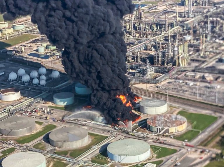 Smoke billows from a tank fire at the Marathon Petroleum facility in Garyville, La., Friday, Aug. 25, 2023. Garyville is located about 40 miles up the Mississippi River from New Orleans.