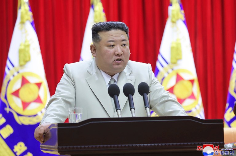 This photo provided on Tuesday, Aug. 29, 2023, by the North Korean government, North Korean leader Kim Jong Un speaks during his visit to the navy headquartesr in North Korea, on Aug. 27, 2023.  (Korean Central News Agency/Korea News Service via AP)