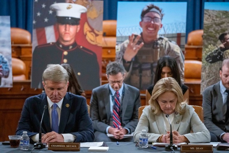 Foreign Affairs Committee Chairman Michael McCaul, left, and ranking member Rep. Madeleine Dean observe a moment of silence at the beginning of a discussion about the terrorist attack at Hamid Karzai International Airport's Abbey Gate.