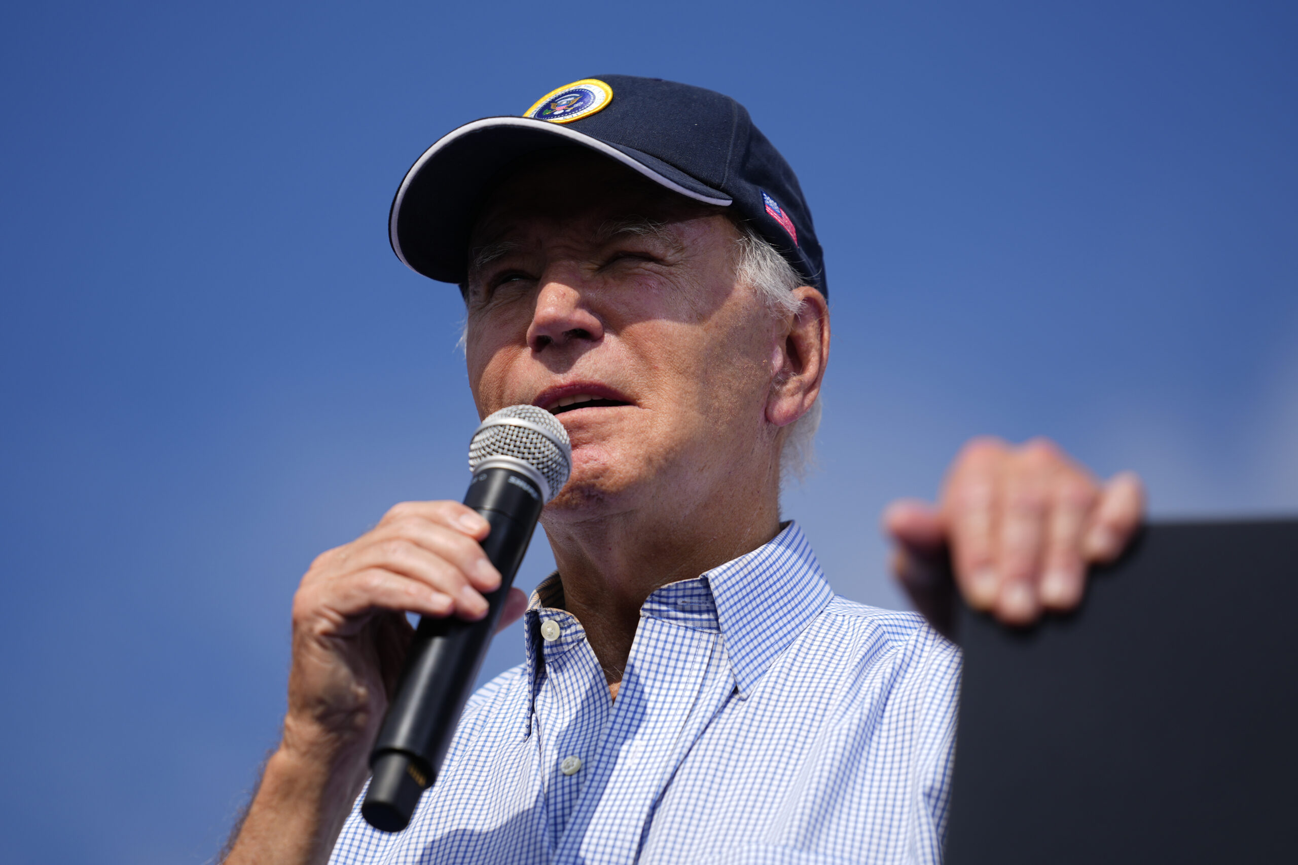 Biden addresses higher costs in campaign ad blitz