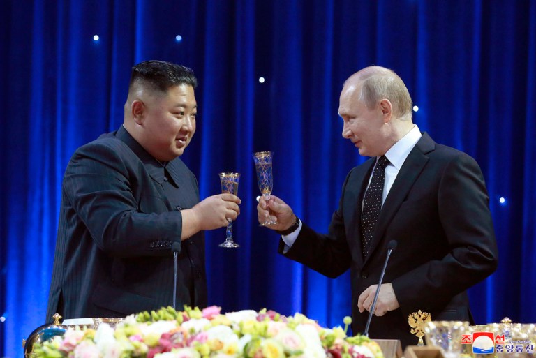 In this photo provided by the North Korean government, North Korean leader Kim Jong Un, left, toasts with Russian President Vladimir Putin in Vladivostok, Russia on April 25, 2019. 