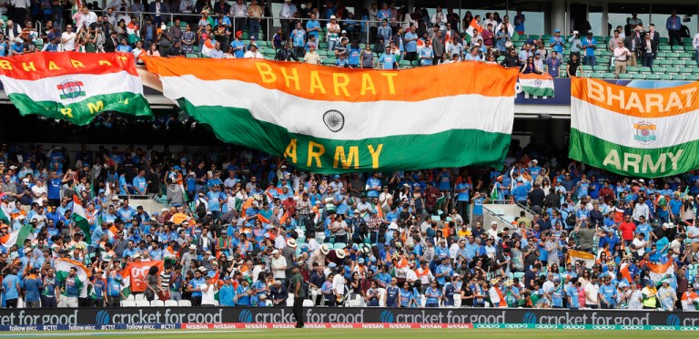 Indian national flags fly during a cricket match in 2017. Prime Minister Narendra Modiâs government has replaced India with the Sanskrit word 'Bharat' in dinner invitations sent for the Group of 20 summit.