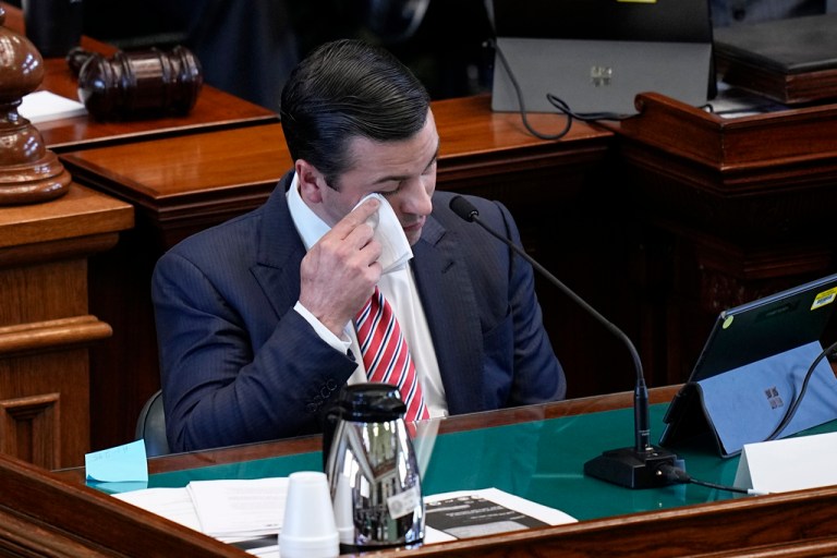 Whistleblower witness Ryan Vassar, former deputy attorney general, left, wipes away tears as he testifies during day three of the impeachment trial for Texas Attorney General Ken Paxton in the Senate Chamber at the Texas Capitol, Thursday, Sept. 7, 2023, in Austin, Texas.