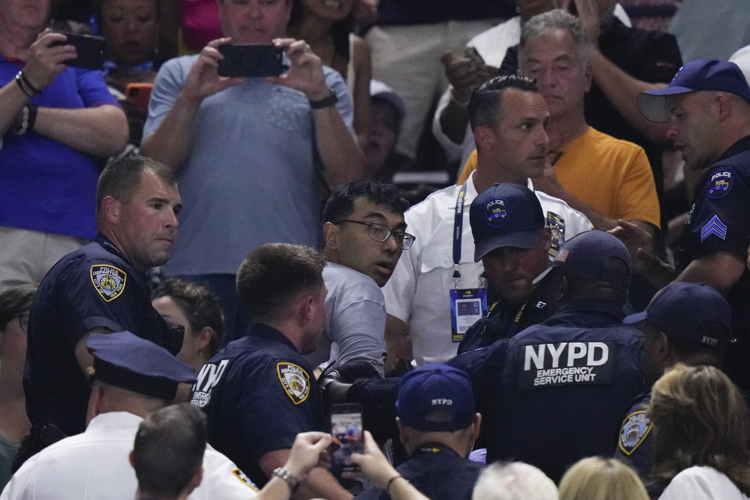 Climate protesters at US Open semifinal charged