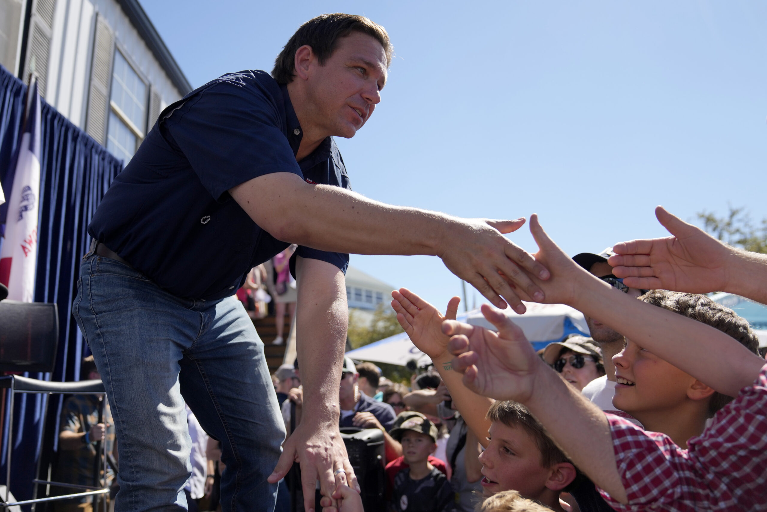 DeSantis trashes Biden push for electric vehicles as he tries to woo Iowa farmers